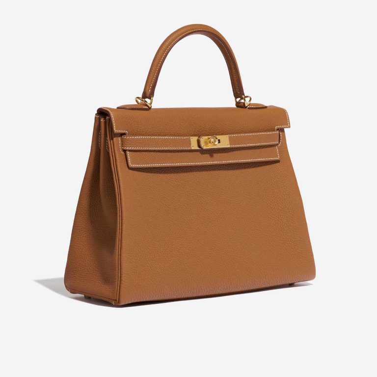 Pre-owned Hermès bag Kelly 32 Togo Gold Brown Side Front | Sell your designer bag on Saclab.com