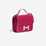 Pre-owned Hermès bag Constance 18 Alligator Framboise Pink Side Front | Sell your designer bag on Saclab.com