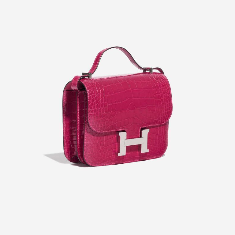 Pre-owned Hermès bag Constance 18 Alligator Framboise Pink Side Front | Sell your designer bag on Saclab.com