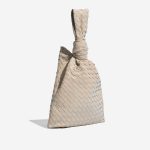 Pre-owned Bottega Veneta bag Twist Medium Lamb Chalk Beige Side Front | Sell your designer bag on Saclab.com