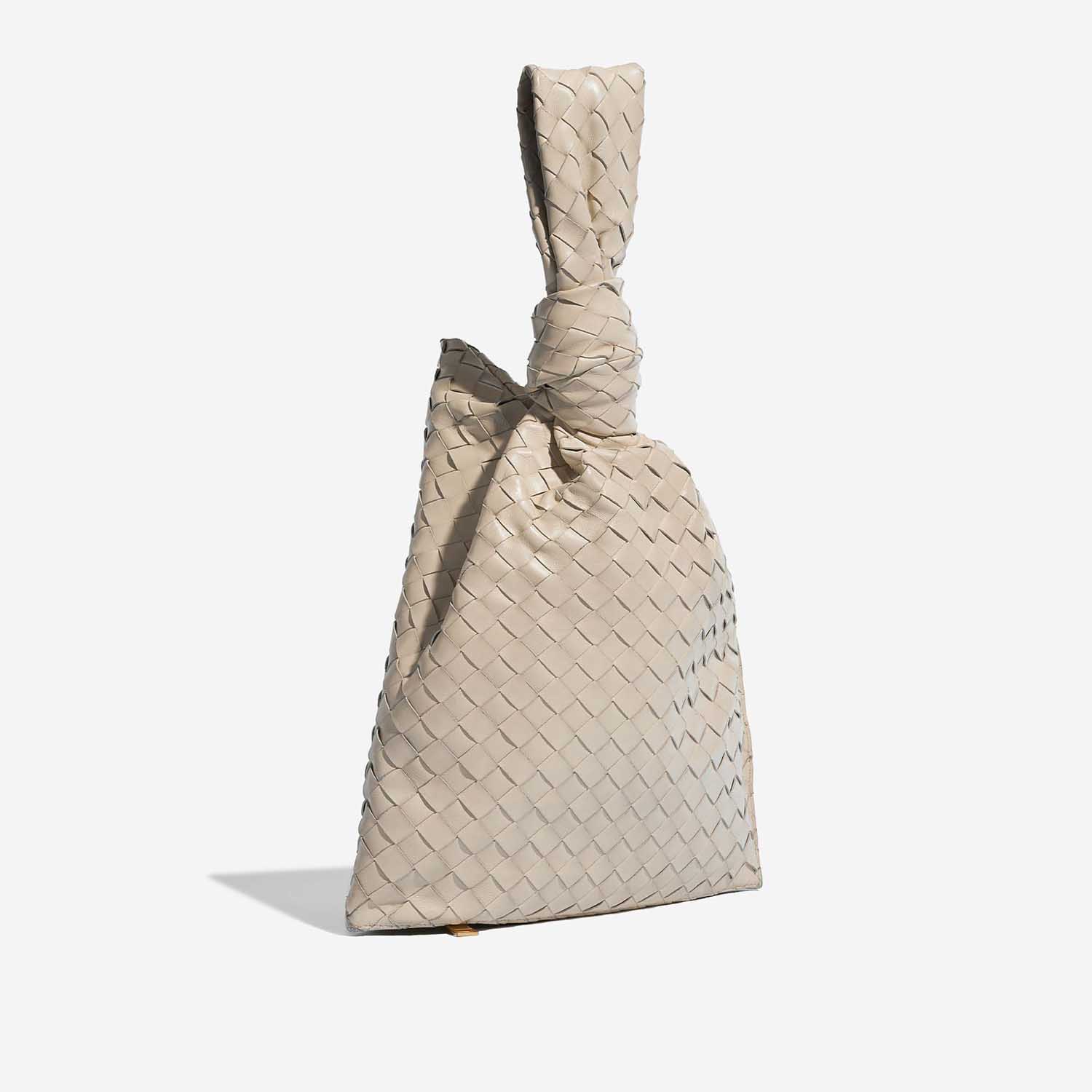 Pre-owned Bottega Veneta bag Twist Medium Lamb Chalk Beige Side Front | Sell your designer bag on Saclab.com
