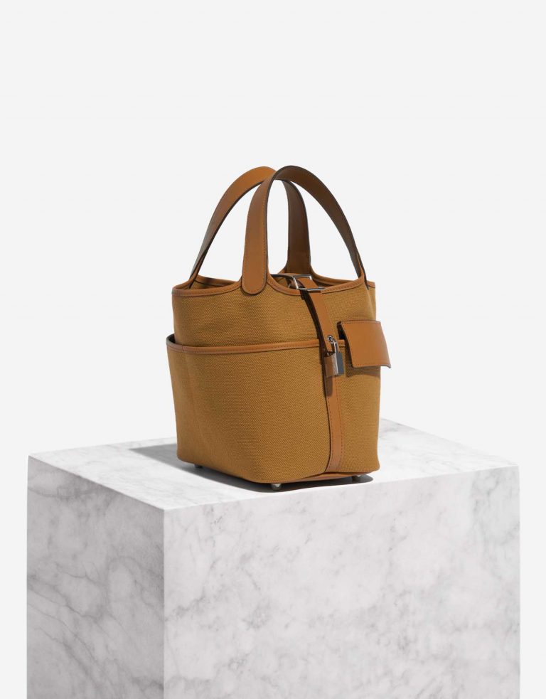 Pre-owned Hermès bag Picotin 18 Cargo Canvas Sesame Brown Side Front | Sell your designer bag on Saclab.com