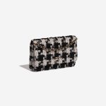 Pre-owned Chanel bag Timeless WOC Tweed Black / White Black, White Side Front | Sell your designer bag on Saclab.com