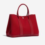 Pre-owned Hermès bag Garden Party 36 Toile Militaire / Veau Negonda Rouge Piment Red Side Front | Sell your designer bag on Saclab.com