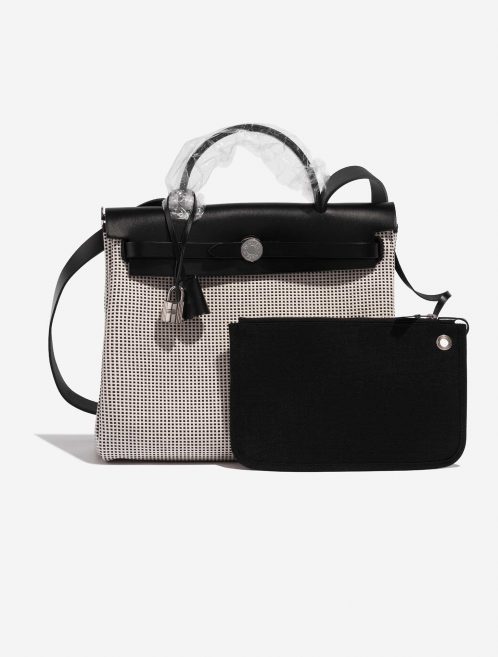 Pre-owned Hermès bag Herbag 31 Toile Quadrille Viking / Vache Hunter Ecru / Black / White Black, White Front | Sell your designer bag on Saclab.com