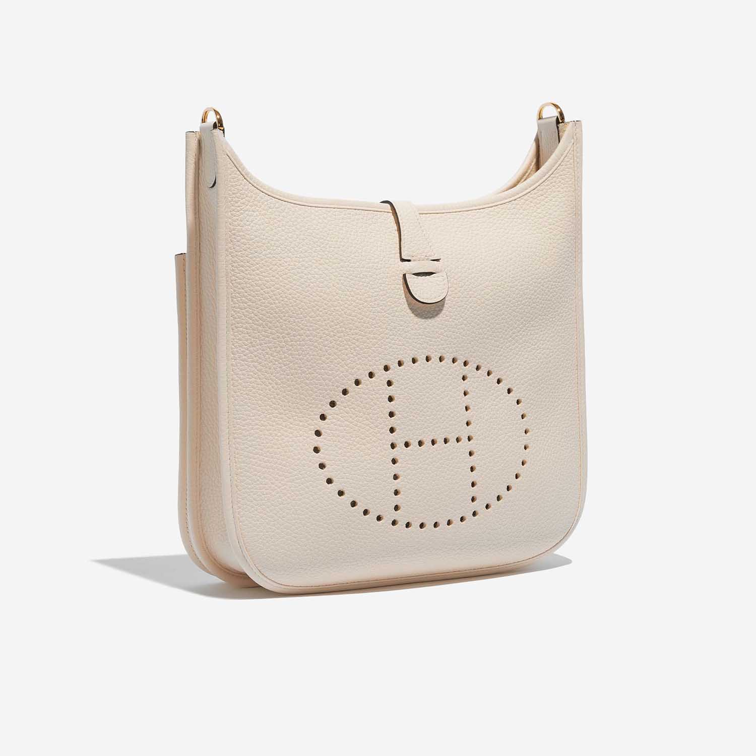 Pre-owned Hermès bag Evelyne 29 Taurillon Clemence Nata Beige Side Front | Sell your designer bag on Saclab.com