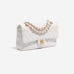 Pre-owned Chanel bag Timeless Medium Caviar White White Side Front | Sell your designer bag on Saclab.com