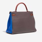Pre-owned Hermès bag Kelly 35 Harlequin Togo Orange /  Etain / Blue Lin / Sanguine / Blue Hydra / Gold Multicolour Side Back | Sell your designer bag on Saclab.com