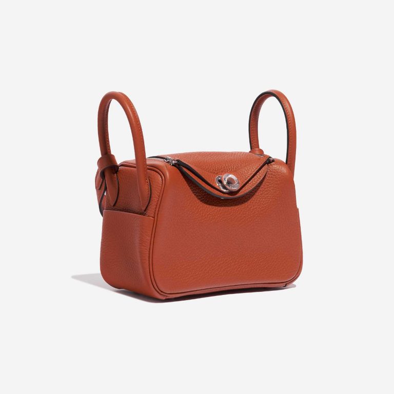 Pre-owned Hermès bag Lindy 20 Mini Clemence Cuivre Red Side Front | Sell your designer bag on Saclab.com