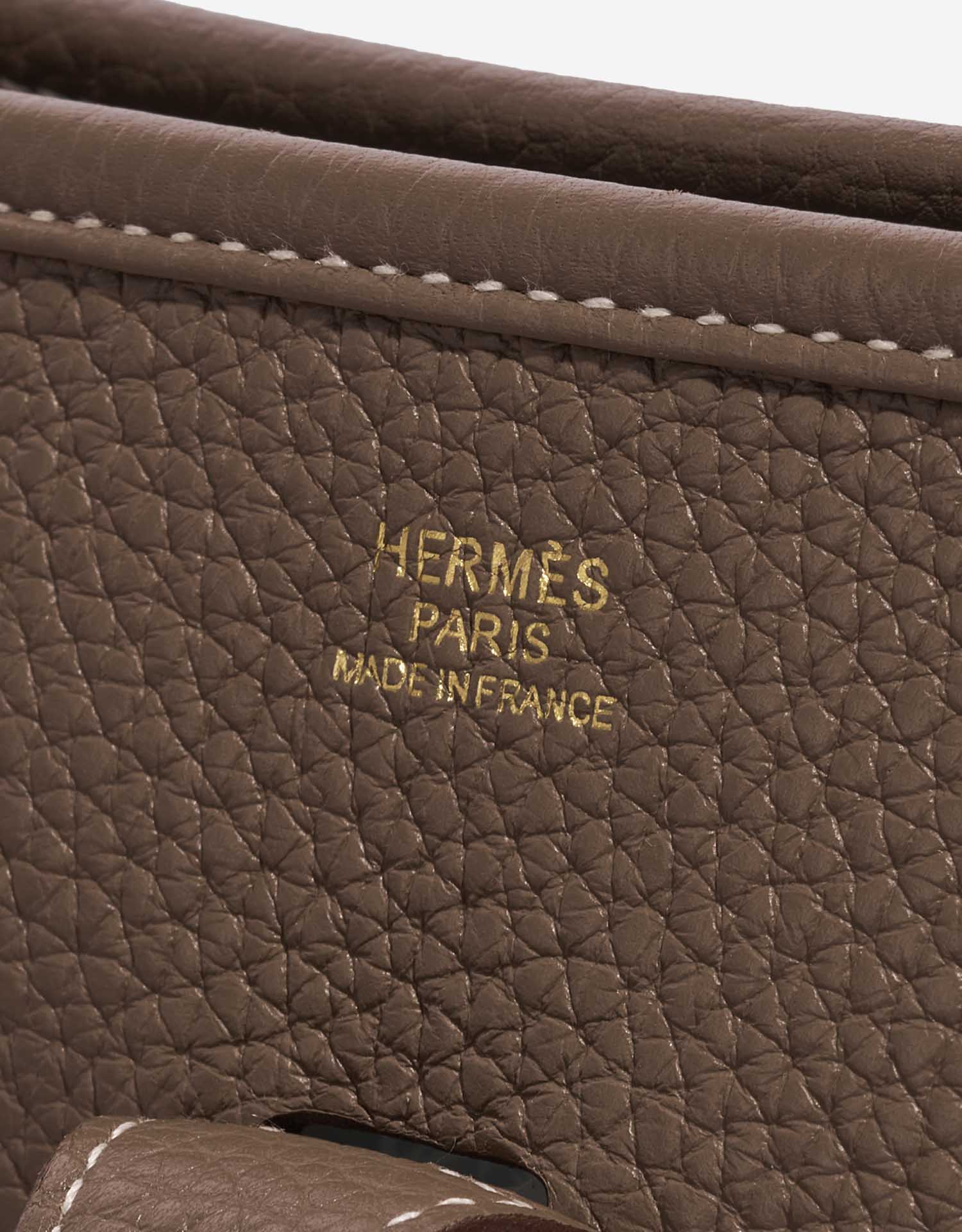 Pre-owned Hermès bag Evelyne 29 Taurillon Clemence Etoupe Brown Logo | Sell your designer bag on Saclab.com