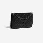 Pre-owned Chanel bag WOC Lamb Black Black Side Front | Sell your designer bag on Saclab.com