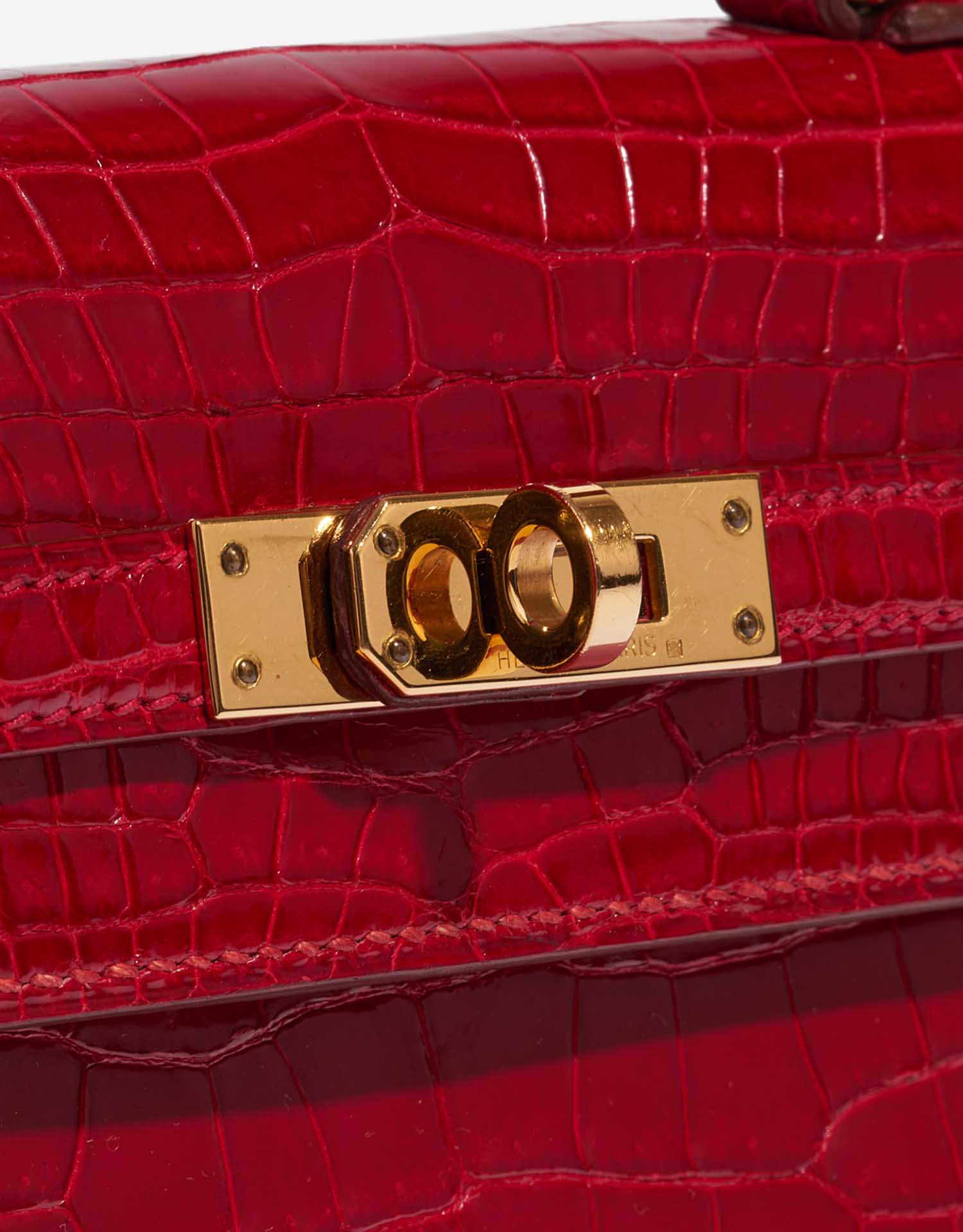Pre-owned Hermès bag Kelly Mini Porosus Crocodile Braise Red Closing System | Sell your designer bag on Saclab.com
