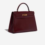 Pre-owned Hermès bag Vintage Kelly 32 Box Rouge H Red Side Front | Sell your designer bag on Saclab.com
