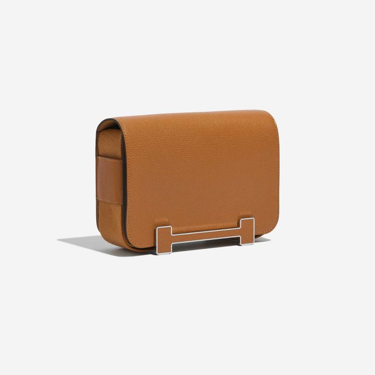 Gebrauchte Hermès Tasche Geta Chevre Mysore Caramel Brown Side Front | Verkaufen Sie Ihre Designer-Tasche auf Saclab.com