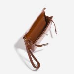 Pre-owned Hermès bag Kelly Dépêches Pouch 25 Toile / Barenia Fauve Beige, Brown Inside | Sell your designer bag on Saclab.com