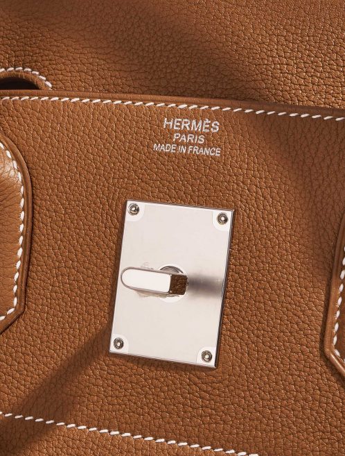 Pre-owned Hermès bag Haut à Courroies 40 Togo Gold Brown Closing System | Sell your designer bag on Saclab.com