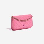 Pre-owned Chanel bag Timeless WOC Lamb Pink / Yellow Pink Side Front | Sell your designer bag on Saclab.com