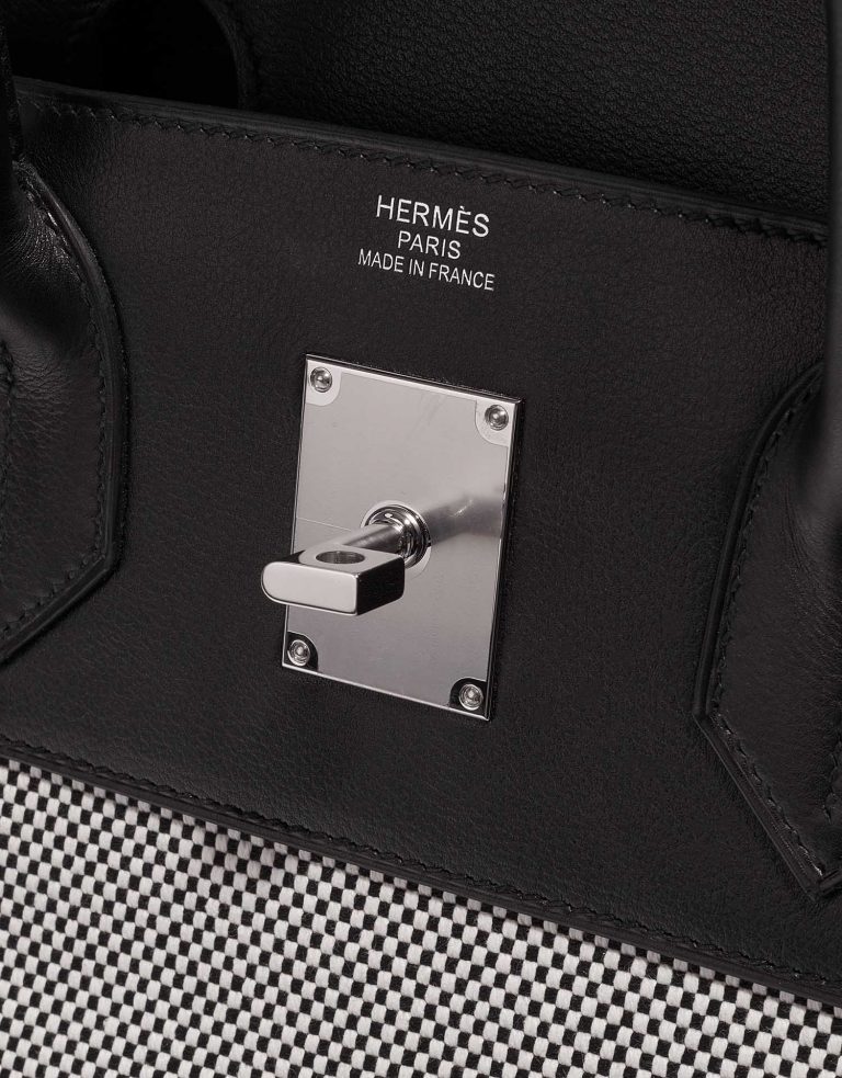 Pre-owned Hermès bag Haut à Courroies 40 Toile Criss / Veau Evergrain Black / Ecru Grey Logo | Sell your designer bag on Saclab.com