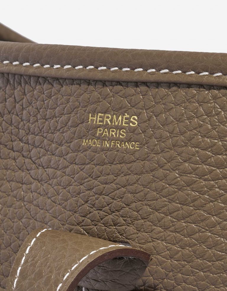 Pre-owned Hermès bag Evelyne 29 Taurillon Clemence Etoupe Beige Logo | Sell your designer bag on Saclab.com