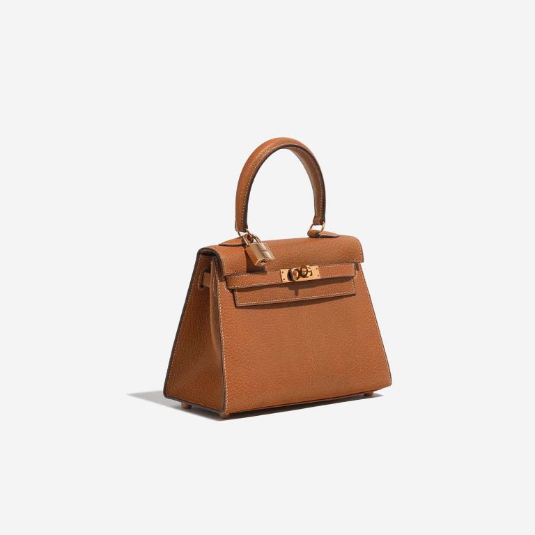 Pre-owned Hermès bag Kelly Mini Porc Gold Brown Side Front | Sell your designer bag on Saclab.com