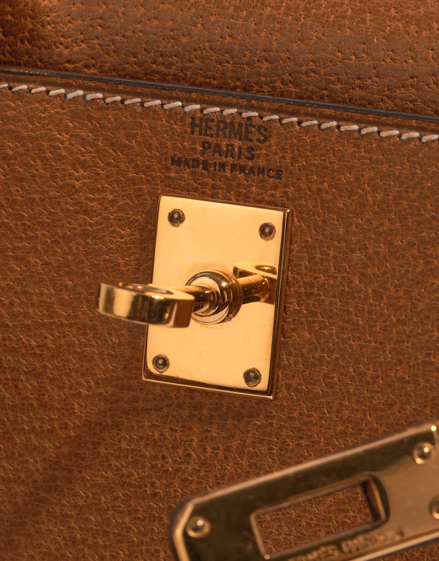 Gebrauchte Hermès Tasche Kelly Mini Porc Gold Brown Logo | Verkaufen Sie Ihre Designer-Tasche auf Saclab.com
