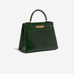 Pre-owned Hermès bag Kelly 28 Alligator Mississippiensis Vert Emeralde Dark Green, Green Side Front | Sell your designer bag on Saclab.com