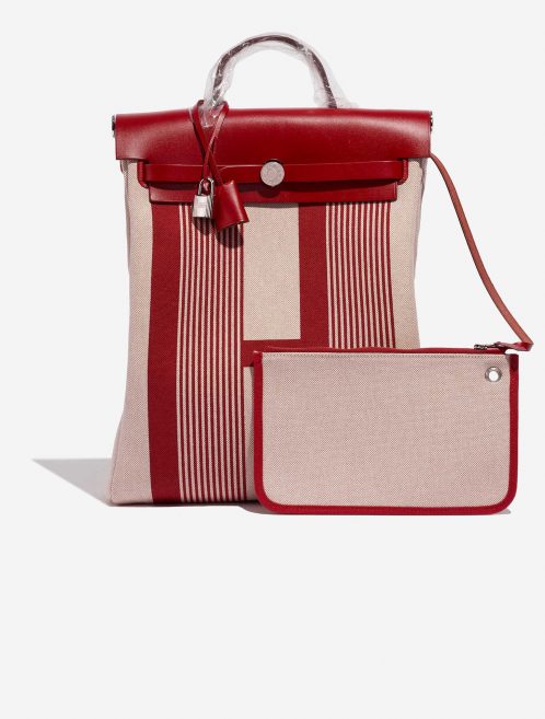 Pre-owned Hermès bag Herbag Backpack Vache Hunter / Toile Bordeaux / Ecru / Beige / Piment Beige, Red Front | Sell your designer bag on Saclab.com