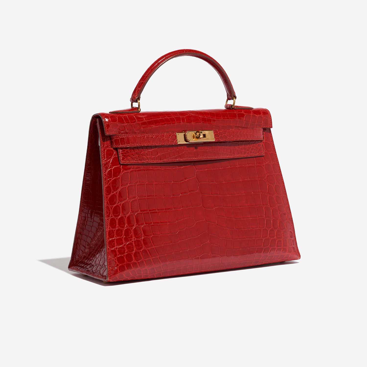 Pre-owned Hermès bag Kelly 32 Niloticus Crocodile Braise Red Side Front | Sell your designer bag on Saclab.com