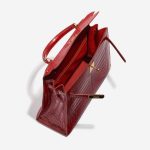 Pre-owned Hermès bag Kelly 32 Niloticus Crocodile Braise Red Inside | Sell your designer bag on Saclab.com
