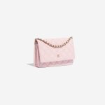 Pre-owned Chanel bag Timeless WOC Caviar Light Pink Pink Side Front | Sell your designer bag on Saclab.com