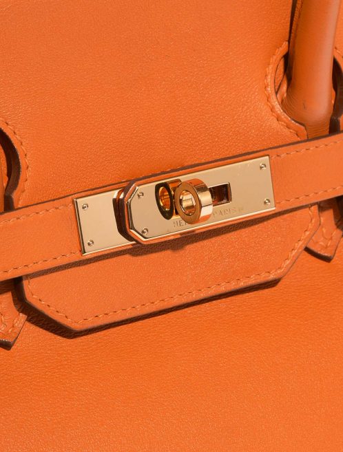 Pre-owned Hermès bag Birkin 35 Swift Orange H Orange Closing System | Sell your designer bag on Saclab.com