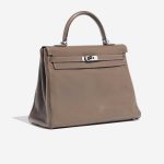 Pre-owned Hermès bag Kelly 35 Swift Etoupe Brown, Grey Side Front | Sell your designer bag on Saclab.com