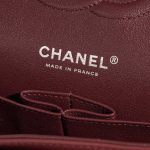 Pre-owned Chanel bag Timeless Medium Lamb Dark Red Red Logo | Sell your designer bag on Saclab.com