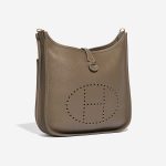 Pre-owned Hermès bag Evelyne 29 Taurillon Clemence Etoupe Beige Side Front | Sell your designer bag on Saclab.com