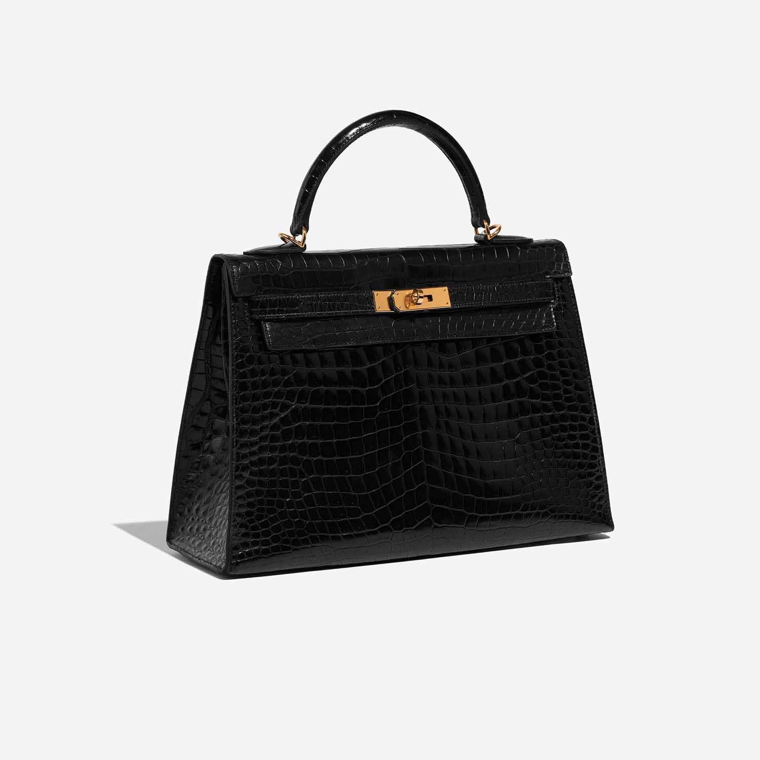 Pre-owned Hermès bag Kelly 32 Porosus Crocodile Black Black Side Front | Sell your designer bag on Saclab.com