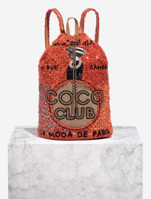 Gebrauchte Chanel Tasche Coco Club Backpack Tweed / Canvas / Pailletten Orange / Beige / Schwarz Orange Front | Verkaufen Sie Ihre Designer-Tasche auf Saclab.com