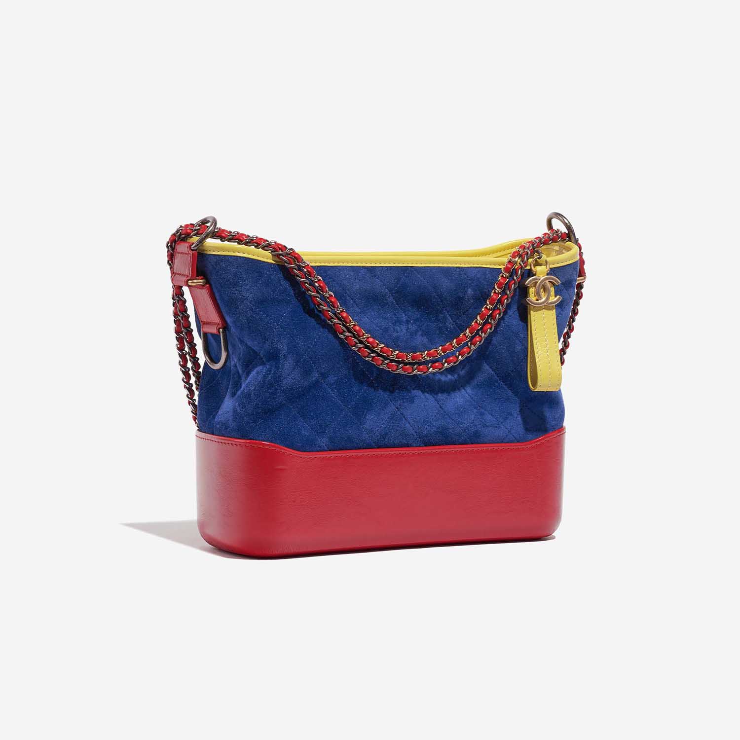 Pre-owned Chanel Tasche Gabrielle Medium Kalbsleder / Wildleder Blau / Rot / Gelb Blau, Multicolour Side Front | Verkaufen Sie Ihre Designer-Tasche auf Saclab.com