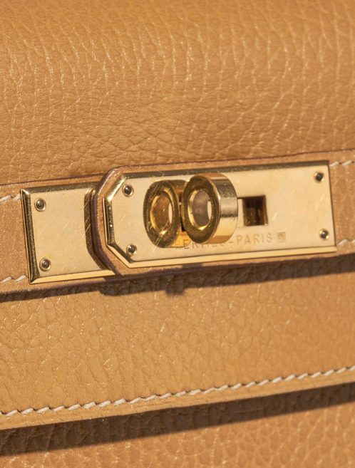 Pre-owned Hermès bag Kelly 32 Ardennes Moutarde Beige Closing System | Sell your designer bag on Saclab.com