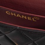 Pre-owned Chanel bag Timeless Handle Small Lamb Black Black Logo | Sell your designer bag on Saclab.com