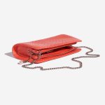 Pre-owned Chanel bag Clutch Python Coral Orange, Red Inside | Sell your designer bag on Saclab.com