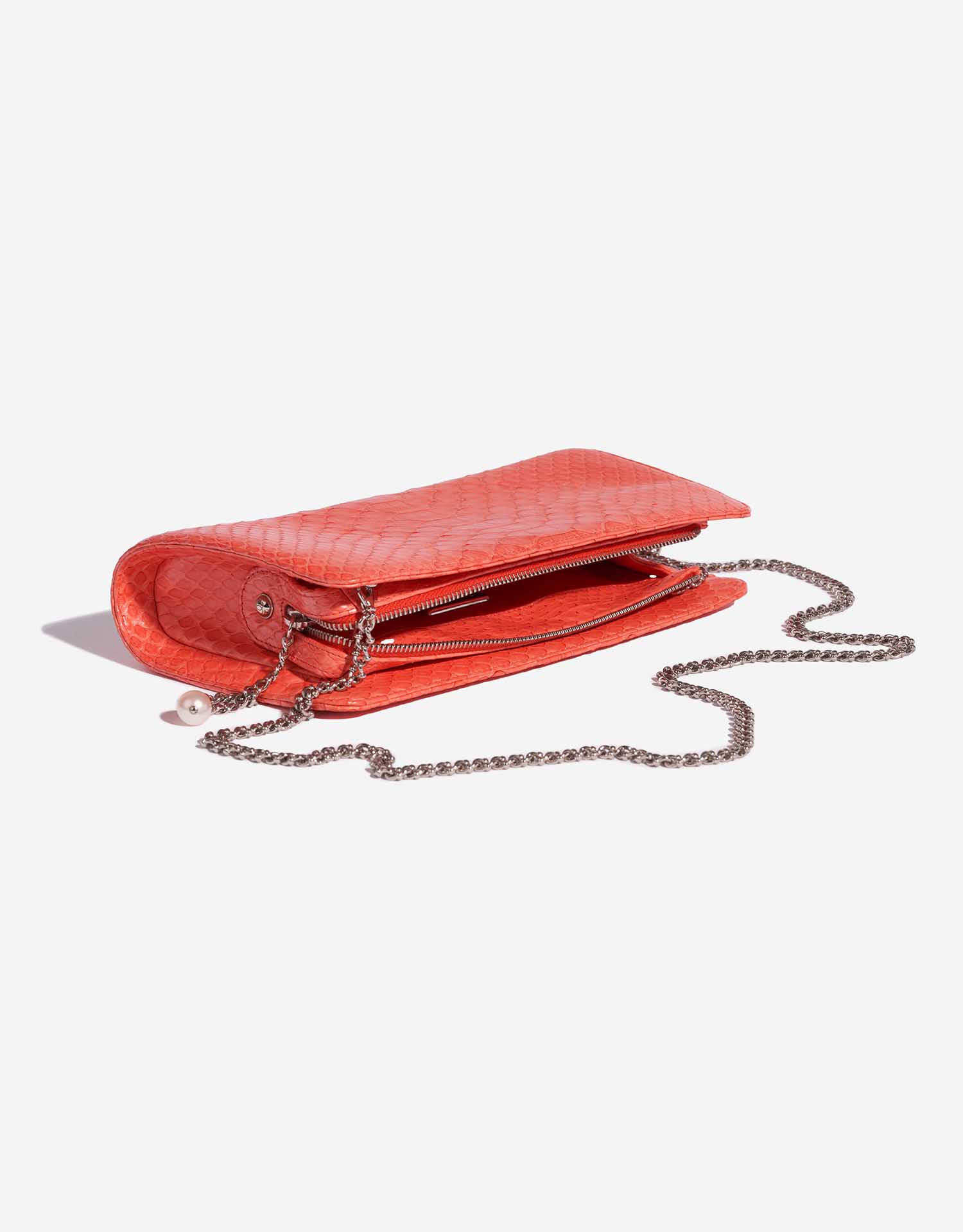 Pre-owned Chanel bag Clutch Python Coral Orange, Red Inside | Sell your designer bag on Saclab.com