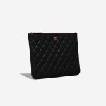 Pre-owned Chanel bag Timeless Clutch Caviar Black Black Side Front | Sell your designer bag on Saclab.com