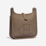 Pre-owned Hermès bag Evelyne 29 Taurillon Clemence Etoupe Brown Side Front | Sell your designer bag on Saclab.com