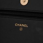 Pre-owned Chanel bag Timeless WOC Lamb Black Lucky Charms Black Logo | Sell your designer bag on Saclab.com