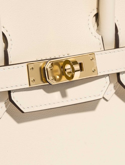 Pre-owned Hermès bag Birkin 25 Swift Nata White Closing System | Sell your designer bag on Saclab.com