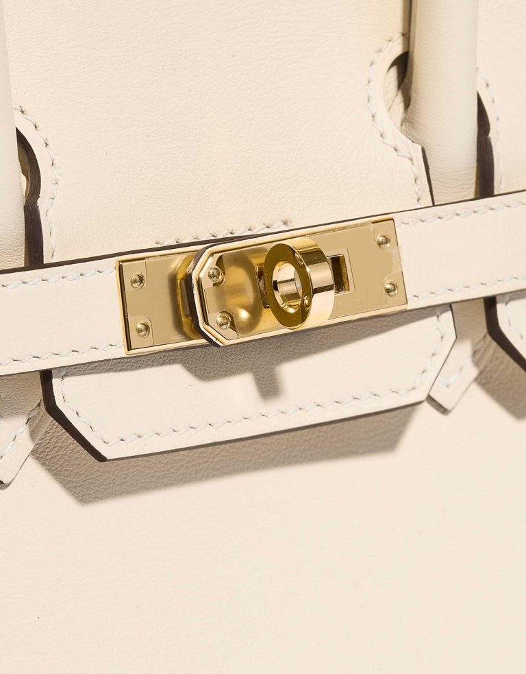 Pre-owned Hermès bag Birkin 25 Swift Nata White Closing System | Sell your designer bag on Saclab.com