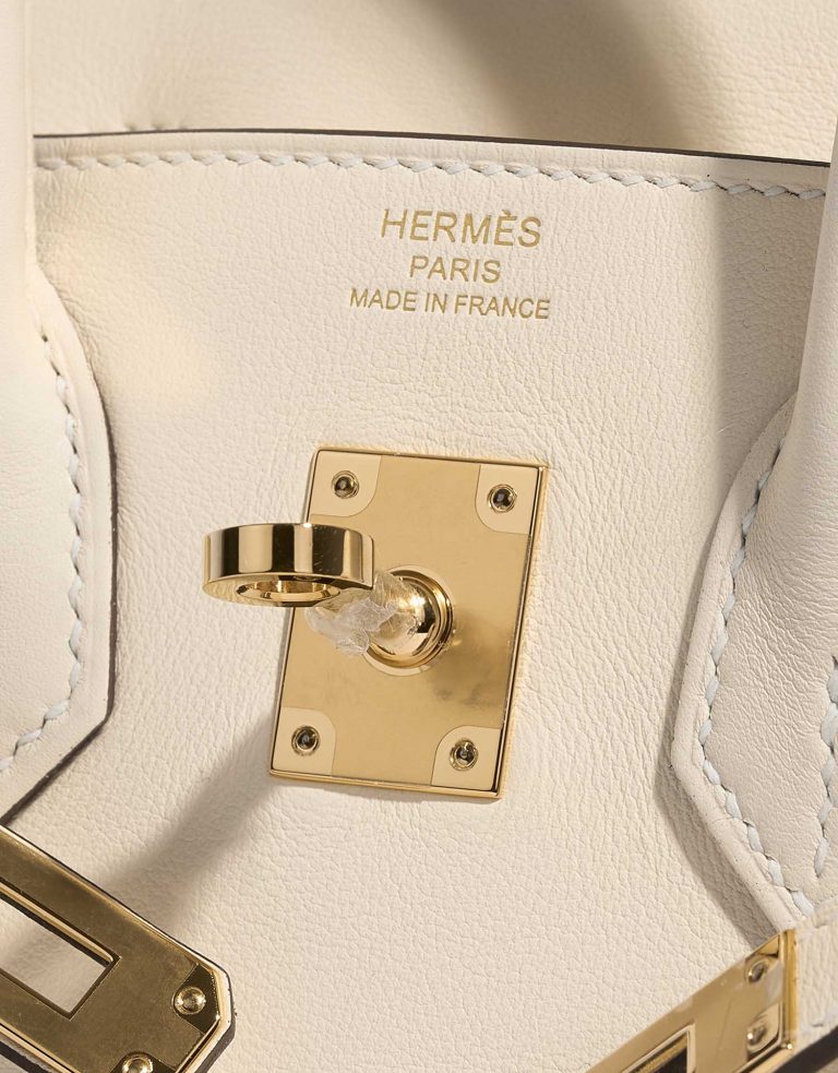 Pre-owned Hermès bag Birkin 25 Swift Nata White Logo | Sell your designer bag on Saclab.com