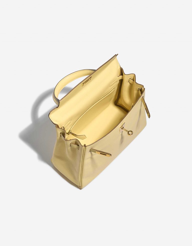 Pre-owned Hermès bag Kelly 25 Swift Jaune Poussin Yellow Inside | Sell your designer bag on Saclab.com