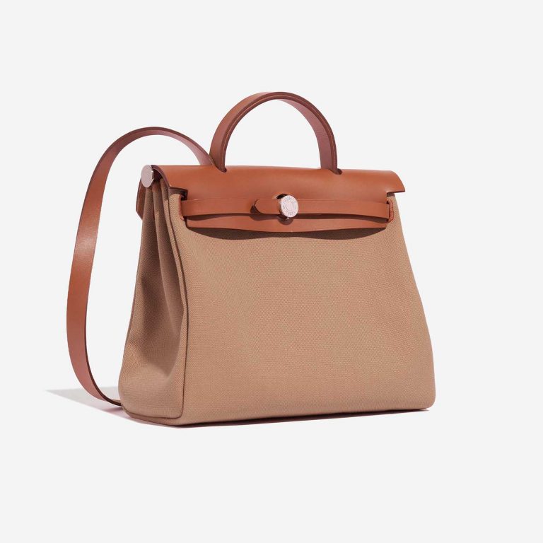 Sac Hermès d'occasion Herbag 31 Vache Hunter / Toile Militaire Fauve / Chai Beige, Brown Side Front | Vendez votre sac de créateur sur Saclab.com