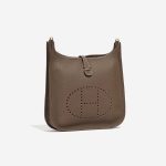 Pre-owned Hermès bag Evelyne 29 Taurillon Clemence Etoupe Brown, Grey Side Front | Sell your designer bag on Saclab.com